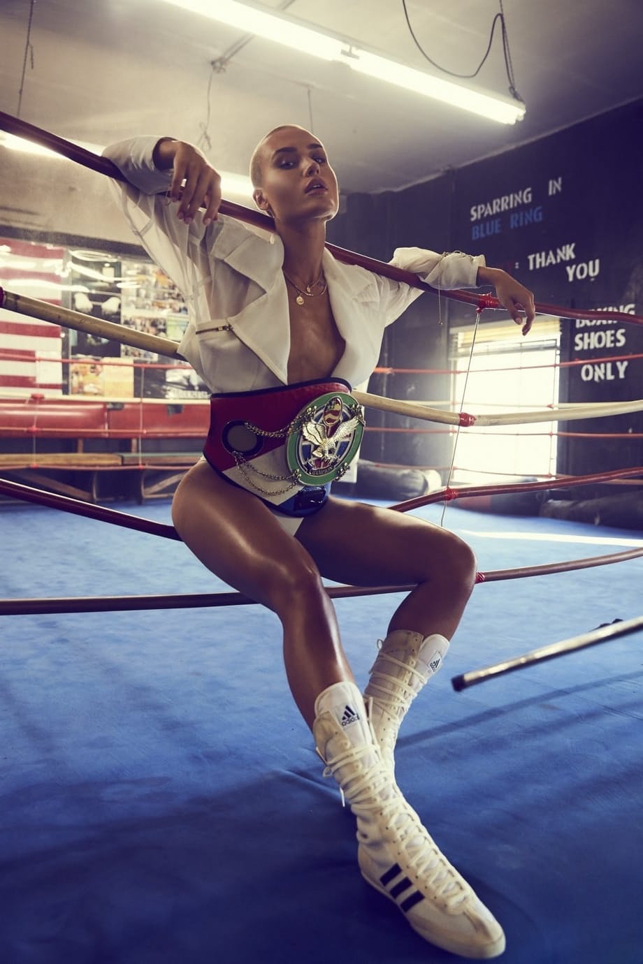 Shots of bald skinny girl Vendela in boxing clothes and naked in a ring