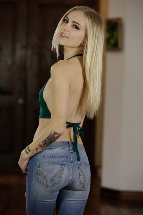 Petite blonde girl Alex Grey slips off her ripped jeans to model in the nude