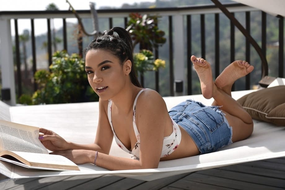 Smoking hot teen Maya Bijou displaying her fantastic feet and boobs