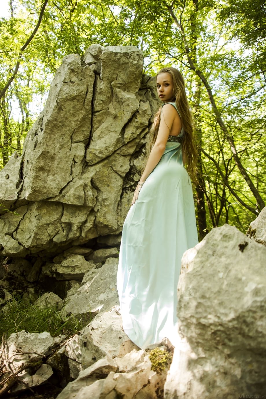 Teen princess in long dress Milena D teases with her hairy pussy in the woods
