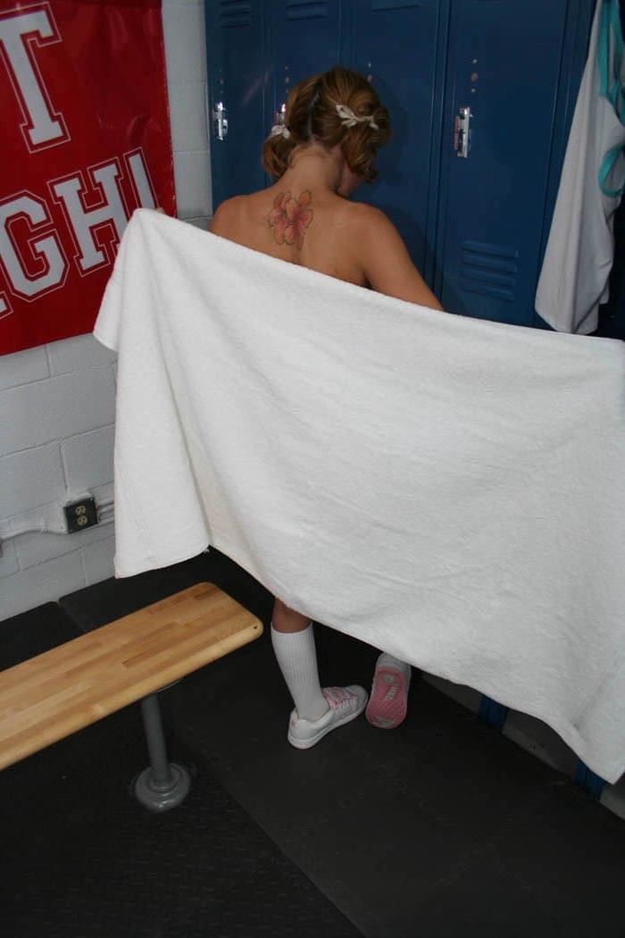 Sexy teen Lexi Belle strips in the locker room and shows her naked body