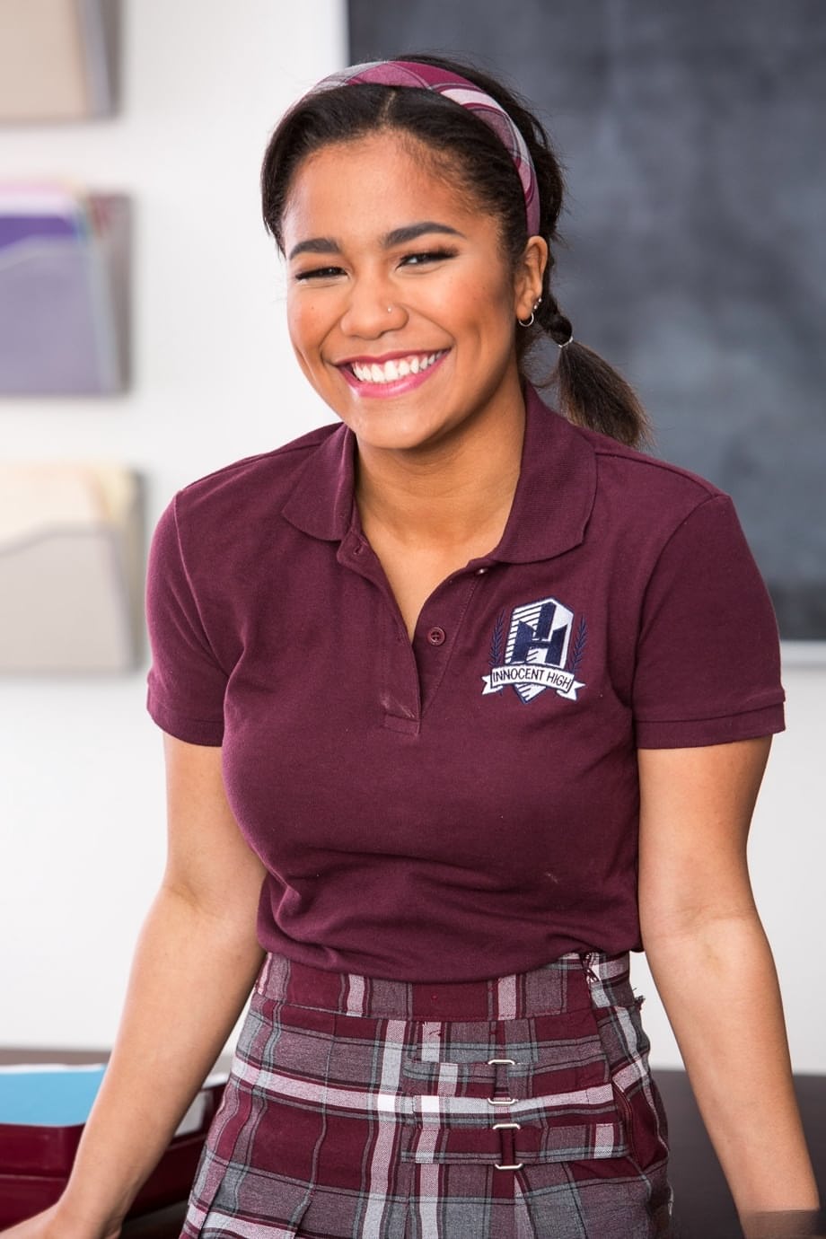 Petite ebony teen Loni Legend gets naked and naughty in the classroom