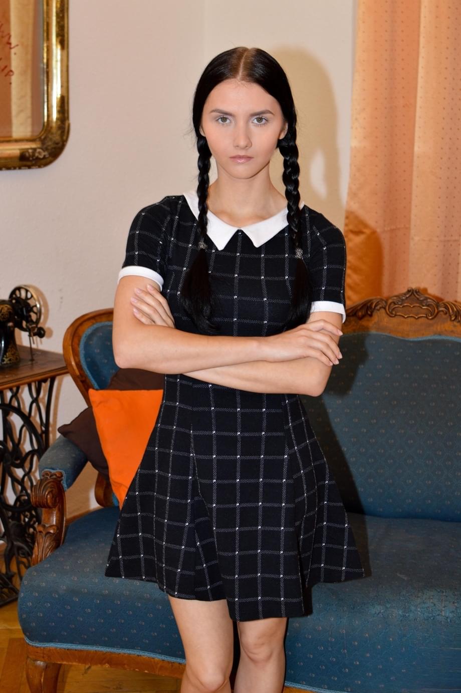 Pigtailed Crystal Greenvelle hikes her skirt to reveal shaved teen pussy