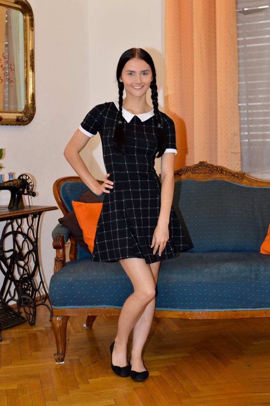 Pigtailed Crystal Greenvelle hikes her skirt to reveal shaved teen pussy