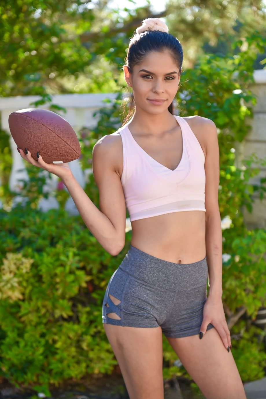 Hot teen Latina Katya Rodriguez undresses and flaunts her tight ass and pussy
