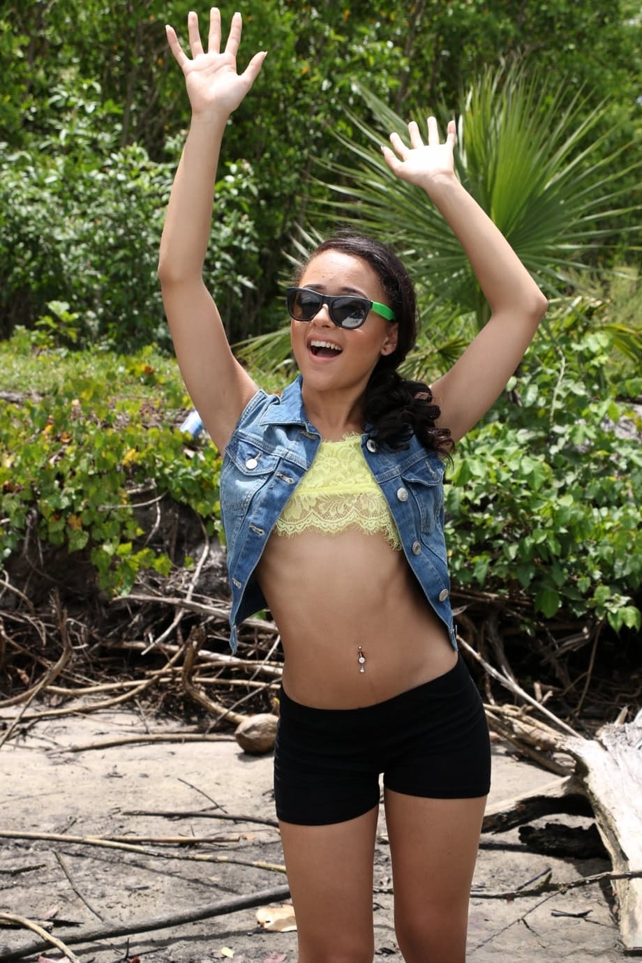 Petite Latina babe Holly Hendrix strips and poses sexily on the boat