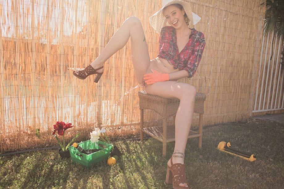 Sweet teen Haley Reed twisting her muff and pissing in the backyard