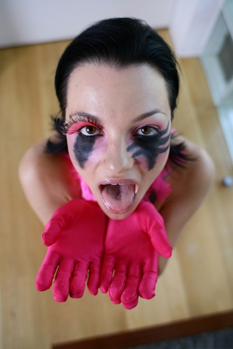 Pornstar Belladonna spreads her pussy lips and shows off her wet love hole