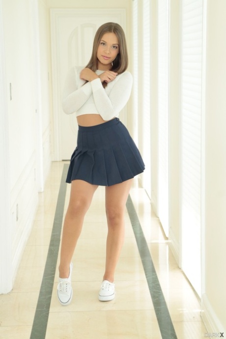 Perfect teen Liza Rowe posing in little skirt, takes it off with her panties