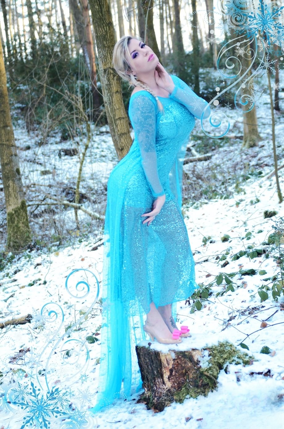 Yuffie Yulan cosplays Elsa from Frozen while displaying her big tits outdoors