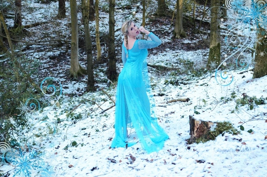 Yuffie Yulan cosplays Elsa from Frozen while displaying her big tits outdoors