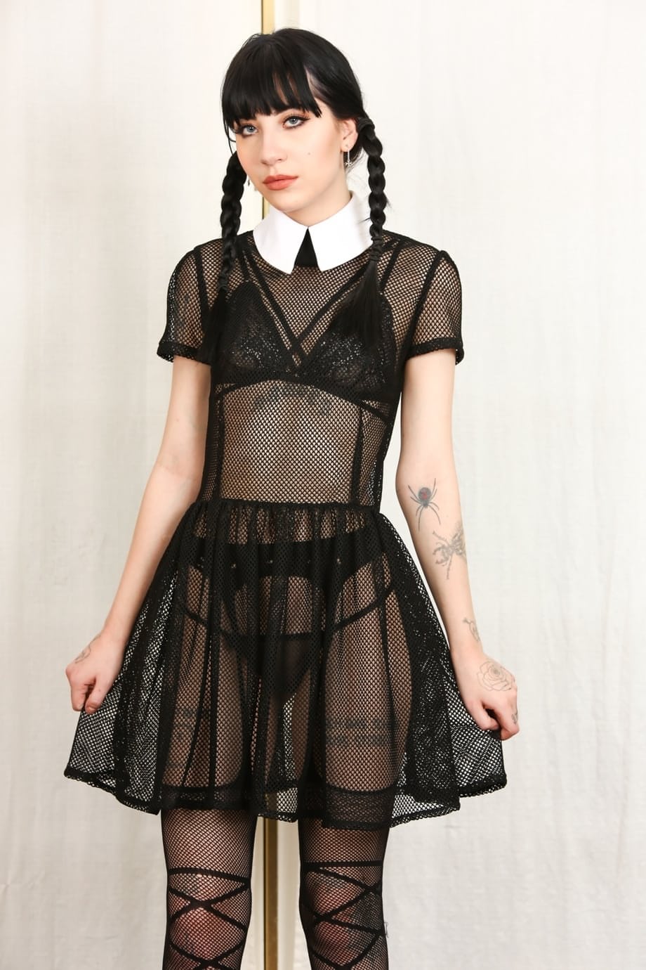 Tall thin Charlotte Sartre as Wednesday Addams strips her sheer dress to spread