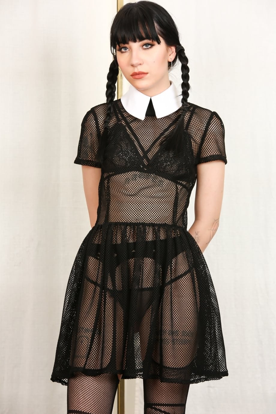 Tall thin Charlotte Sartre as Wednesday Addams strips her sheer dress to spread