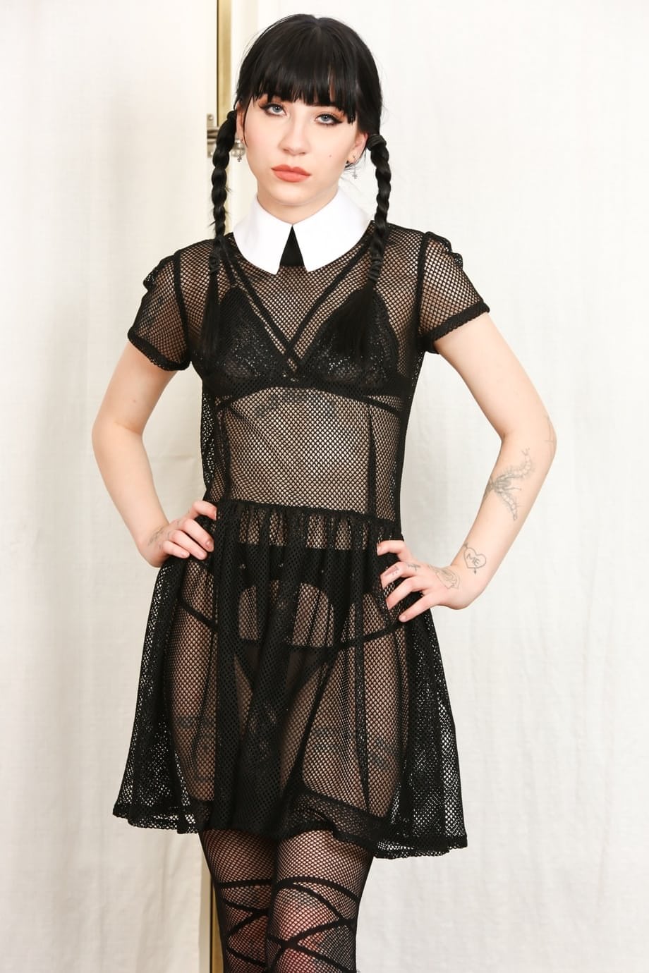 Tall thin Charlotte Sartre as Wednesday Addams strips her sheer dress to spread