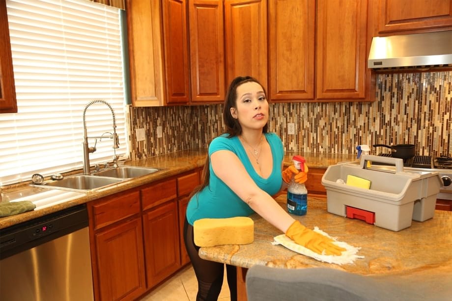 American maid Alycia Starr takes off her clothes while cleaning the house