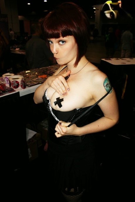 Hot tattooed Joanna Angel & her sexy Burning Angels pose & pet at a sex con