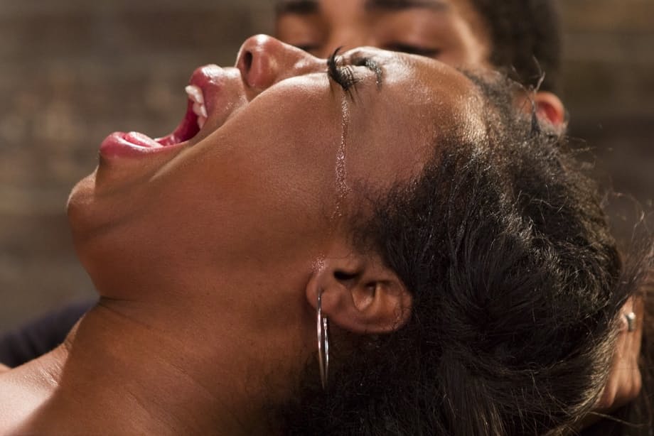 Black chick Lisa Tiffian is restrained with rope for the pleasure of white men
