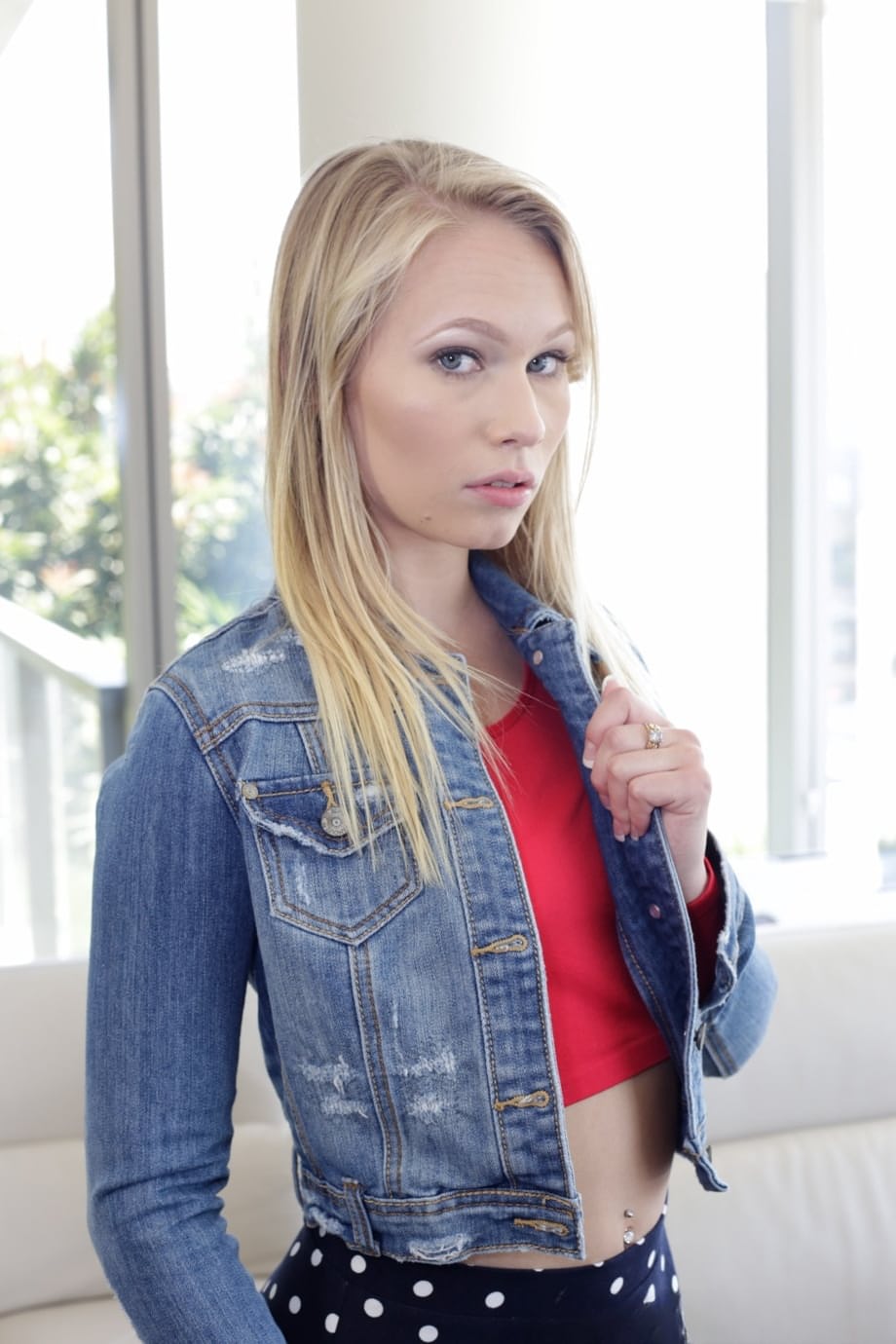 Pretty blonde Dakota James in pink thong flaunts her amazing bubble butt