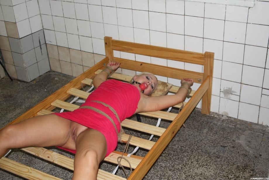 Poor blonde Veronica with naked sweet pussy tied up on a strange bed