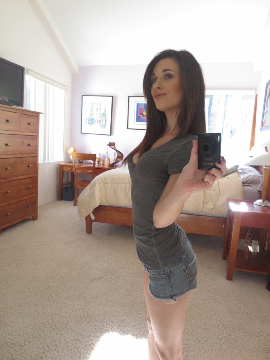 Lacey Channing flaunts her natural tits and gets naked and takes sexy selfies