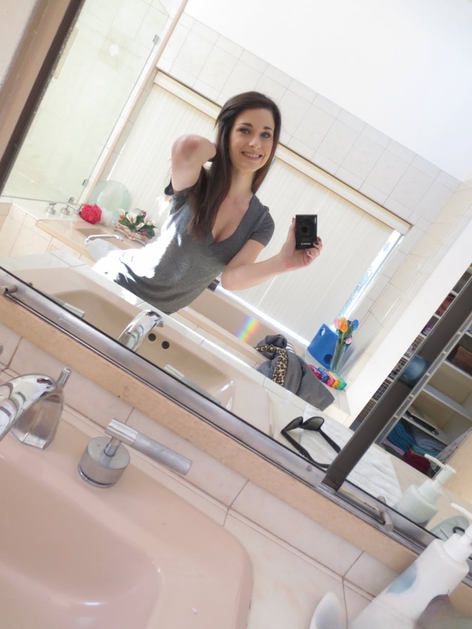 Lacey Channing flaunts her natural tits and gets naked and takes sexy selfies