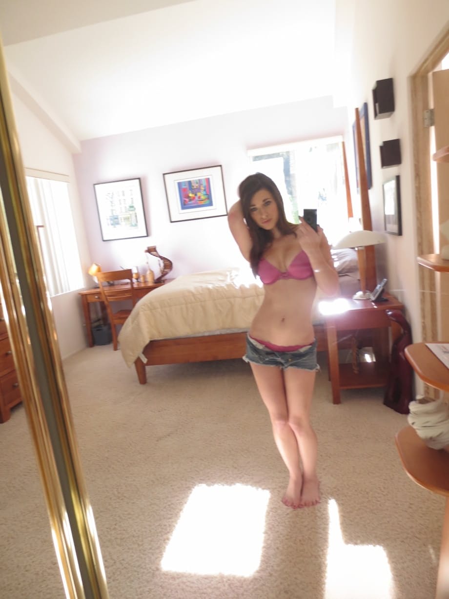 Lacey Channing flaunts her natural tits and gets naked and takes sexy selfies