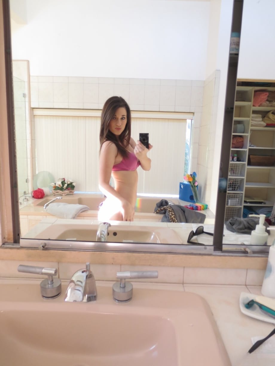 Lacey Channing flaunts her natural tits and gets naked and takes sexy selfies
