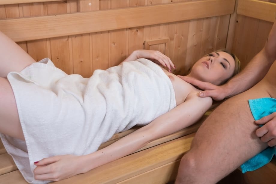 Teen hottie with a flat chest gets fucked by a large dick in the sauna