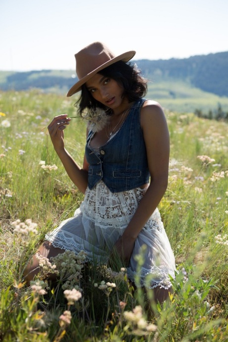 Sultry country girl Angel Constance flashes natural tits & hard nips outdoors
