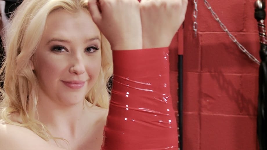Blonde female Samantha Rone submits to being placed in bondage and ball gagged