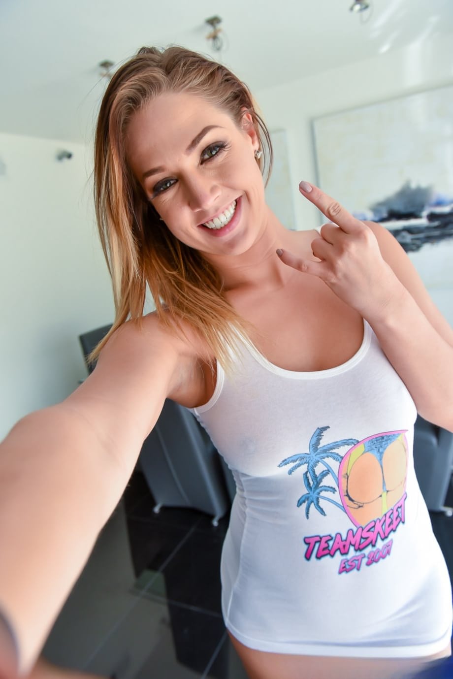 Tiny glasses clad Brooke Haze spanked & fingered by tall blonde Vall Dodds