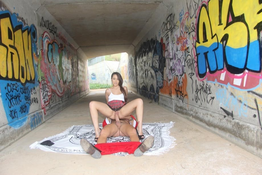 Naughty Latina schoolgirl Nikki Litte gets big cock from Santa in the alleyway