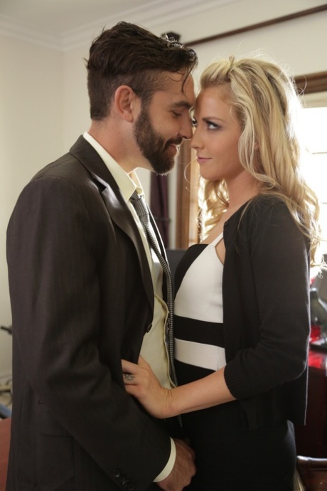 Dark-haired lady goes out of the office and leaves Karla Kush alone with Daniel
