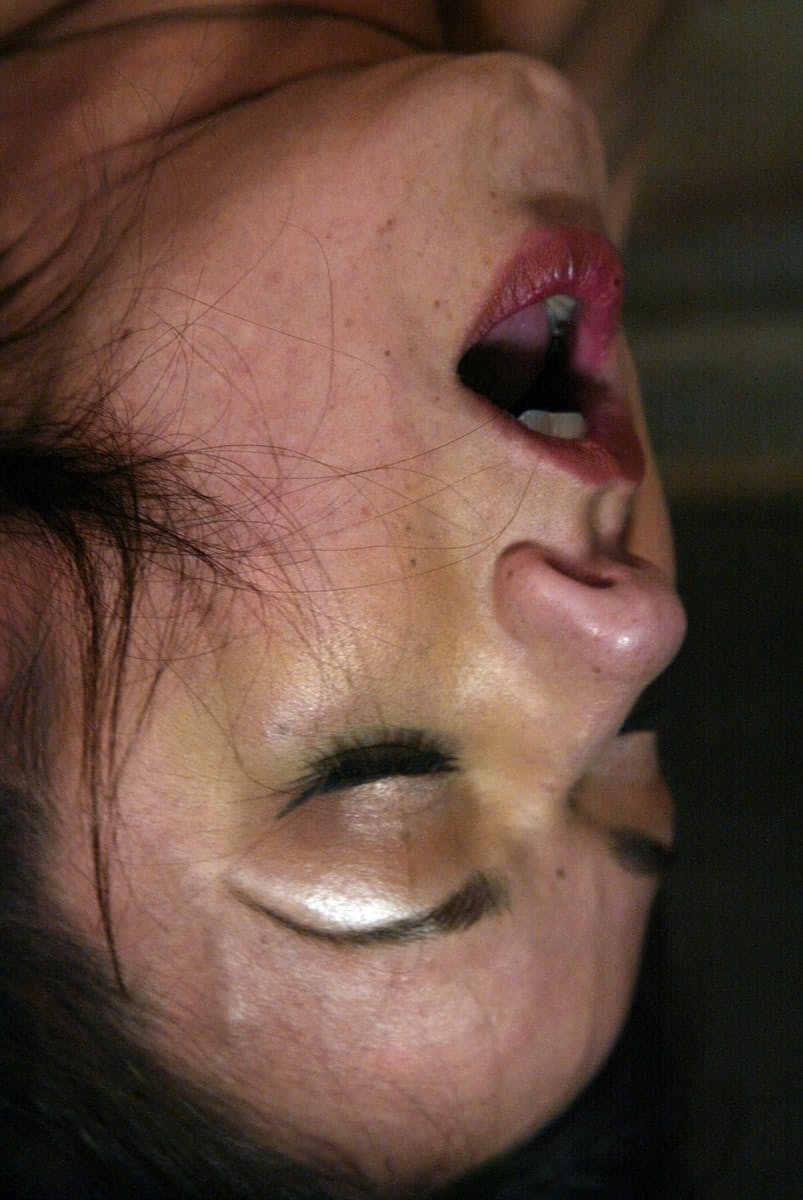 Latina slave Nadia Styles has her face penetrated with a glass bulb