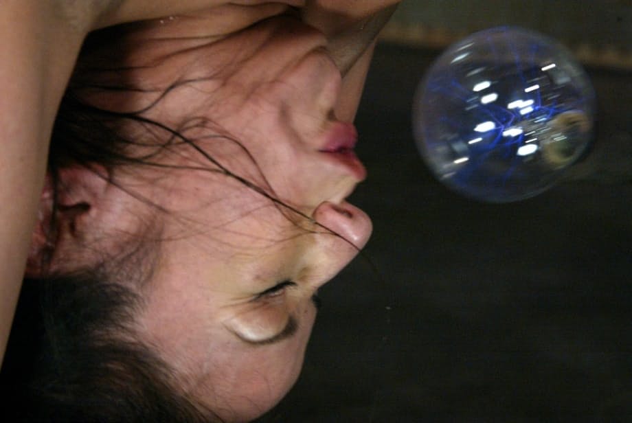Latina slave Nadia Styles has her face penetrated with a glass bulb