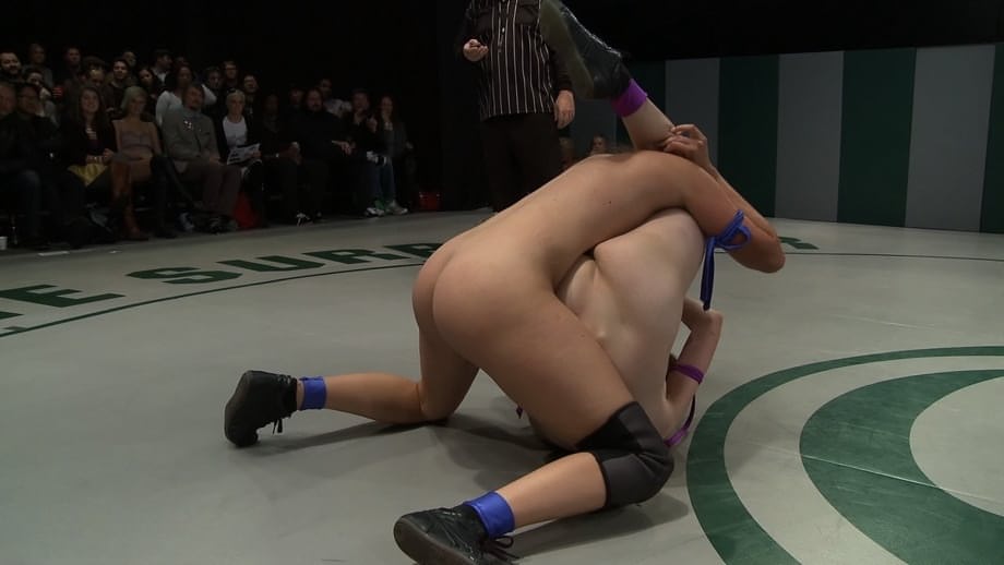 Lesbian wrestlers show their big tits and asses during catfights