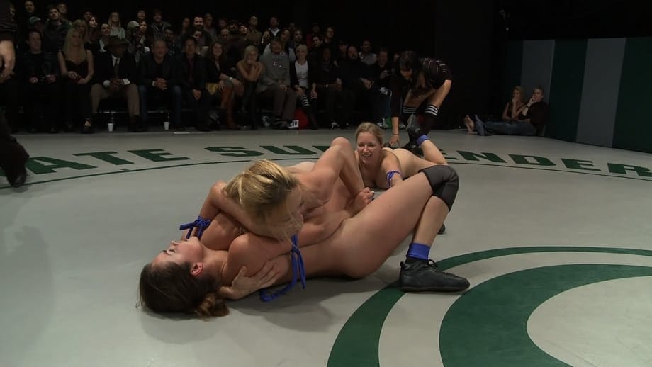 Lesbian wrestlers show their big tits and asses during catfights