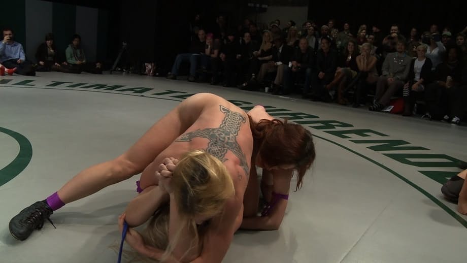 Lesbian wrestlers show their big tits and asses during catfights