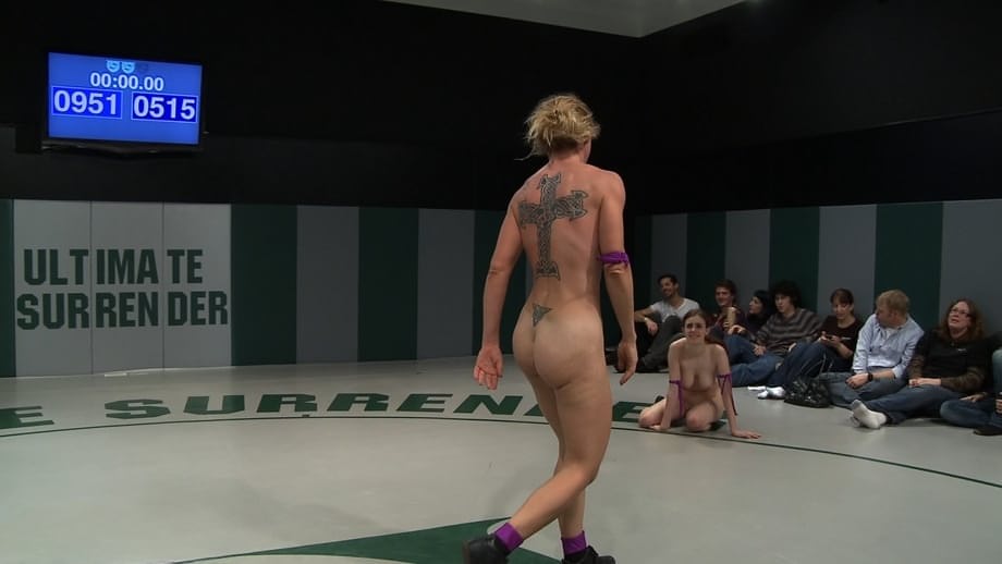 Lesbian wrestlers show their big tits and asses during catfights