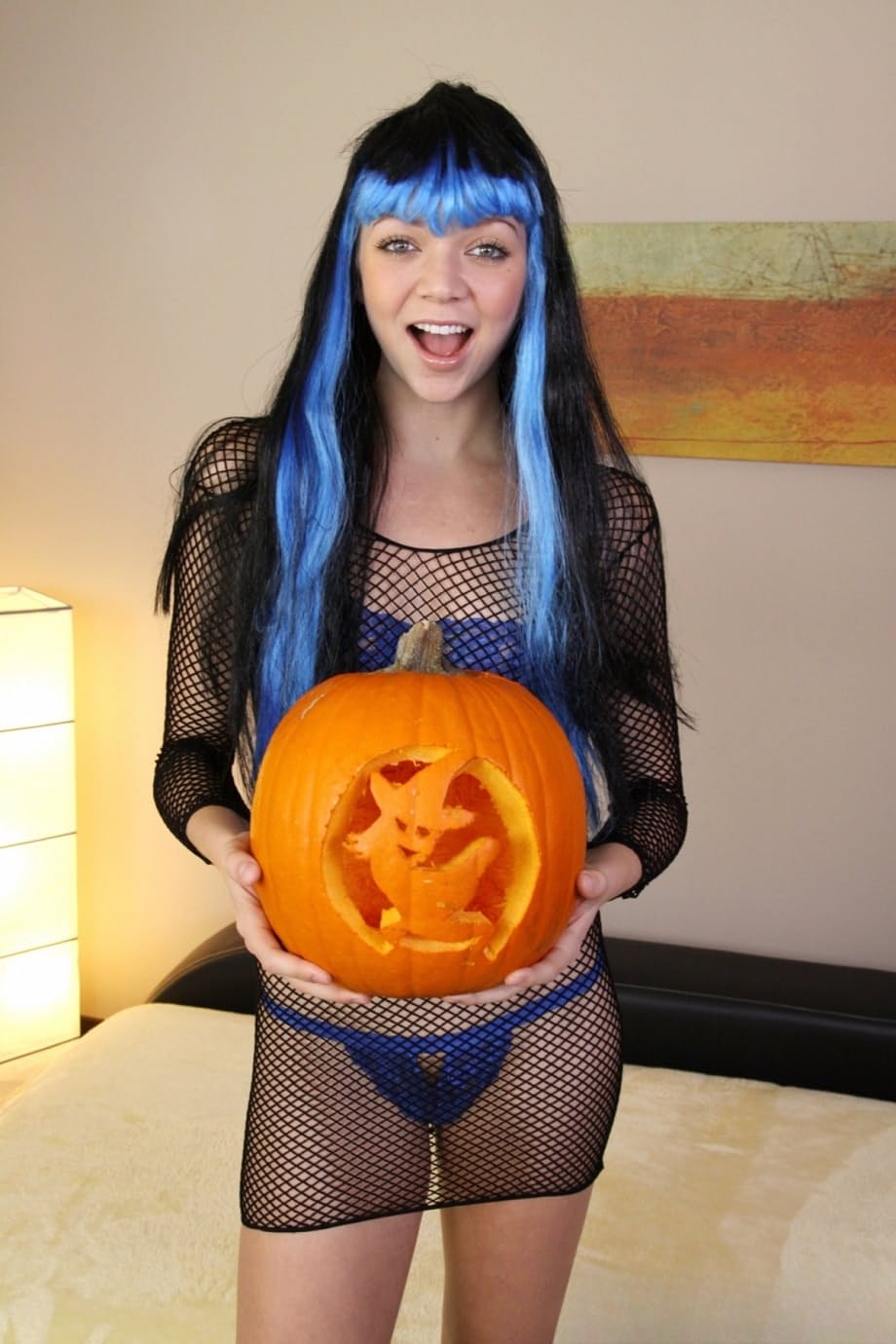 Naughty girl Jessie Andrews deepthroats a cock after pumpkin carving