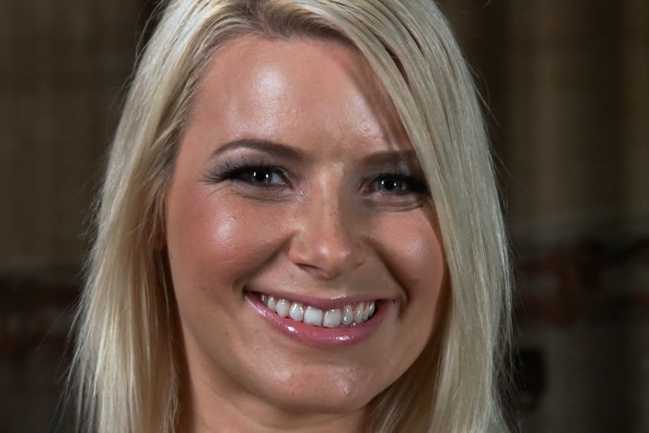 Hot blonde Anikka Albrite strips naked in a dungeon wearing white knee socks