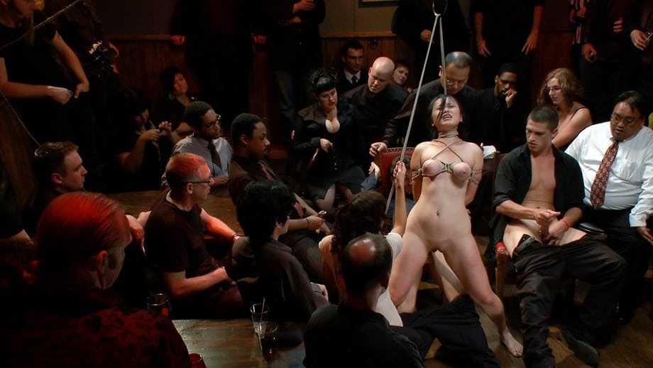Asian Madeleine Mei is invited into lesbian sex during public bondage action