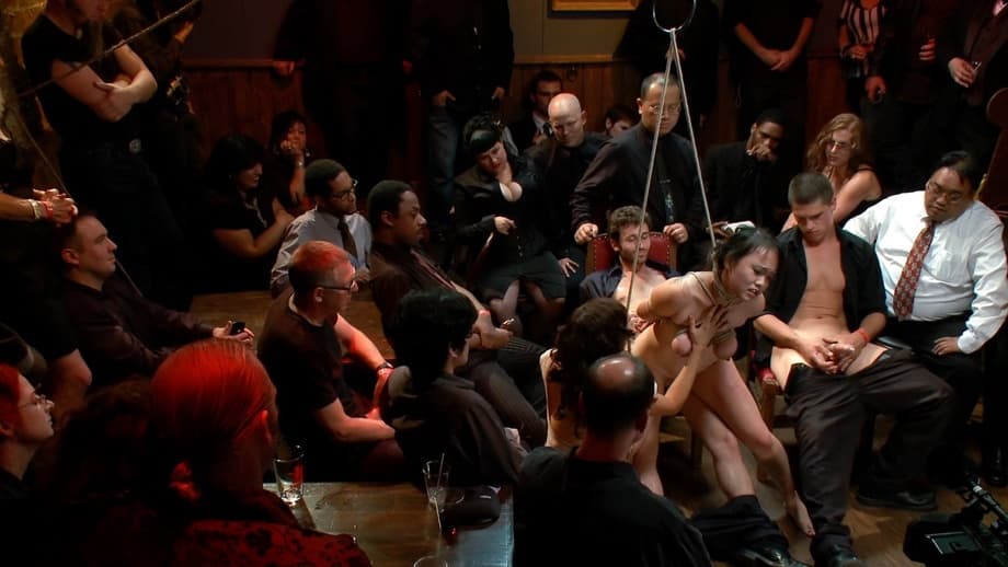 Asian Madeleine Mei is invited into lesbian sex during public bondage action