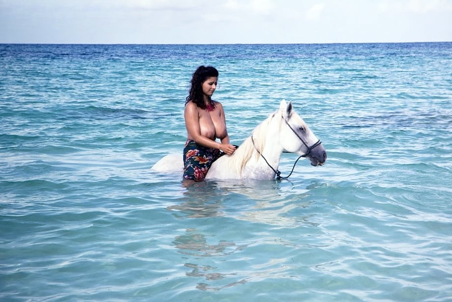 Solo model Chloe Vevrier unleashes her hooters during a day at the beach