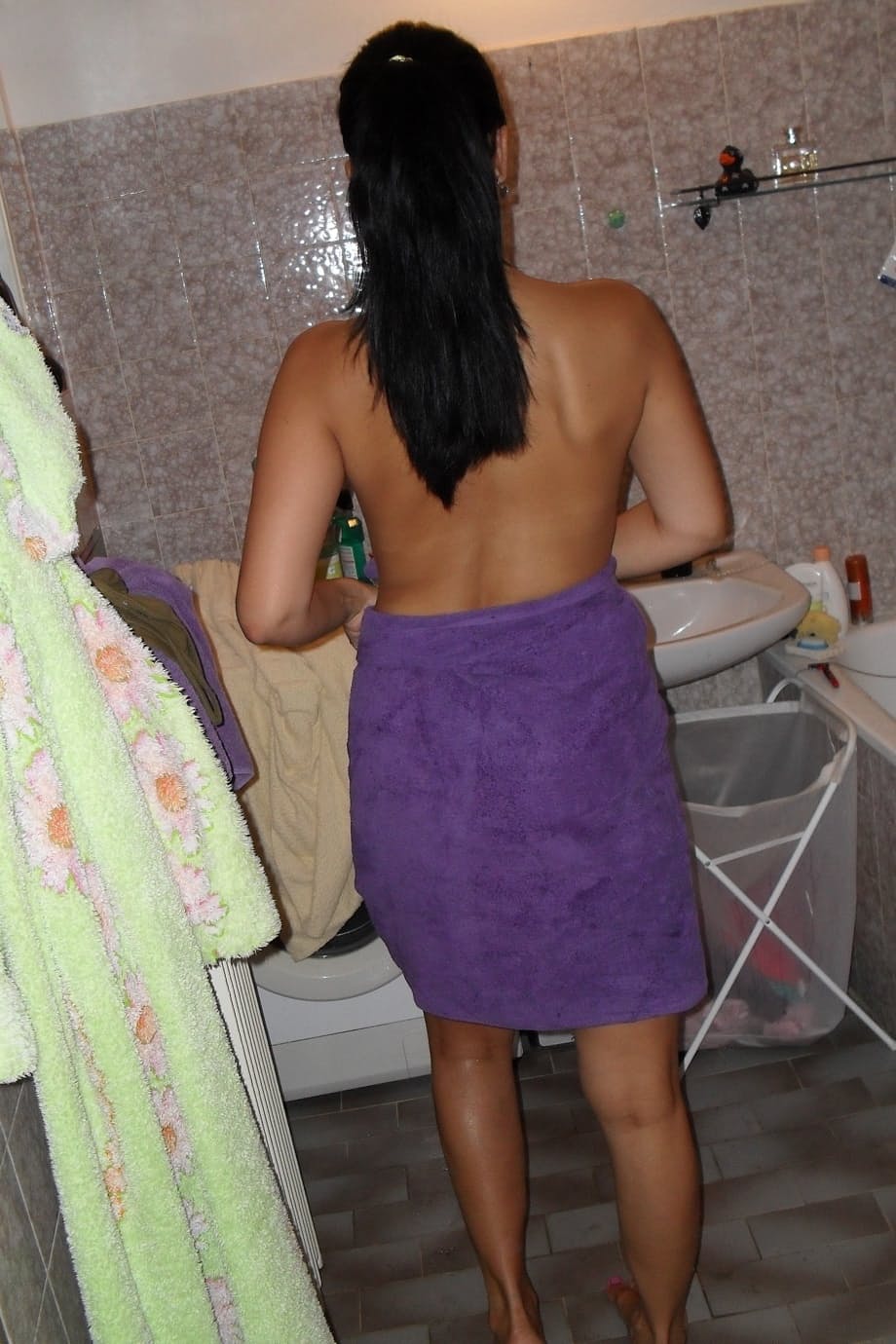 Beautiful mature brunette wets nice tits in shower & shows ass while dressing