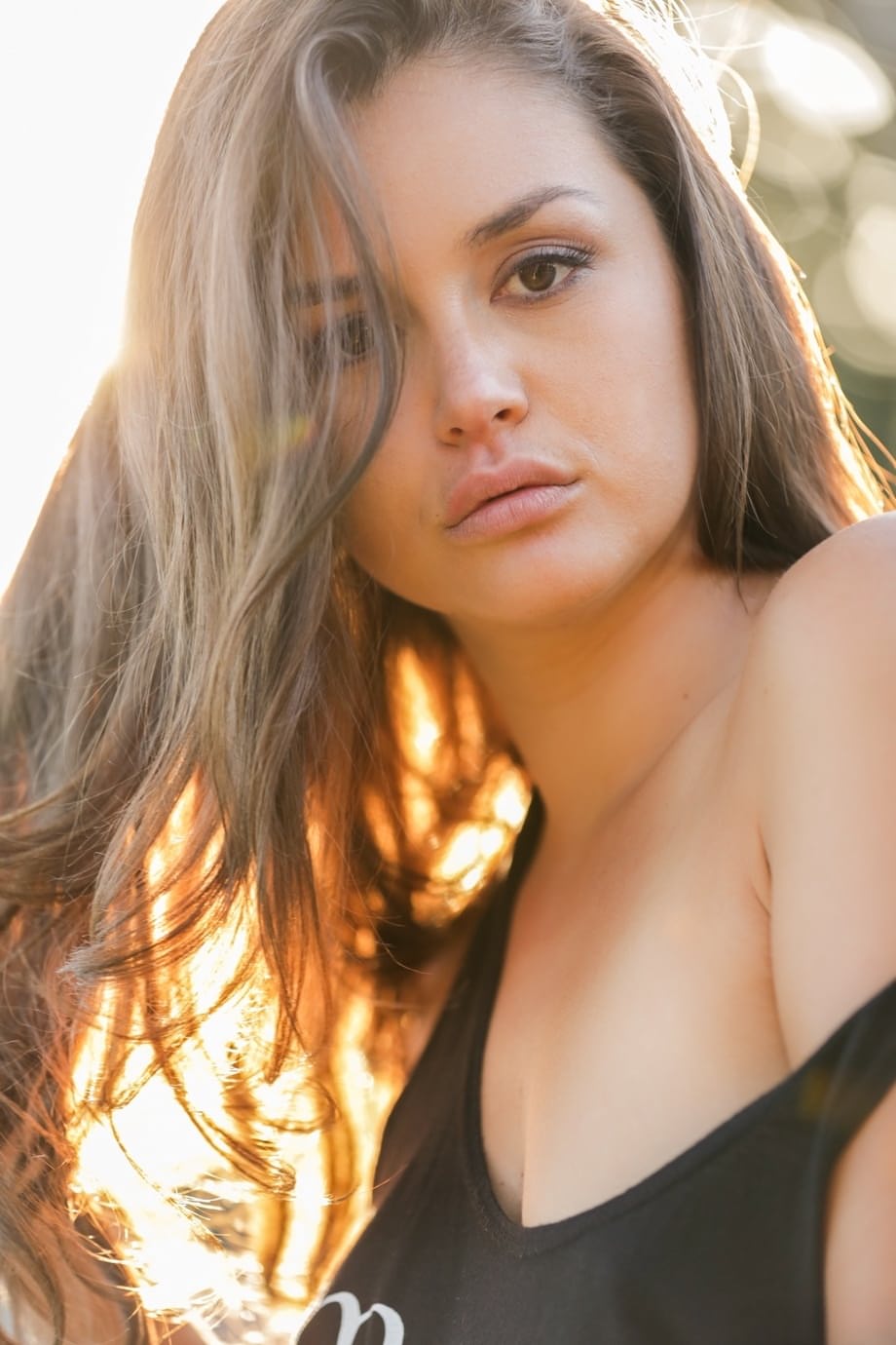Sexy Allie Haze taking tiny jean shorts off and showing trimmed cunt outdoors