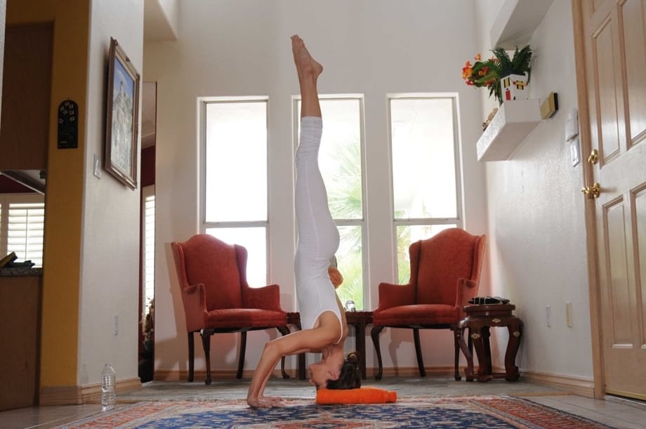 Long legged brunette Jenni Lee stripping down naked and stretching