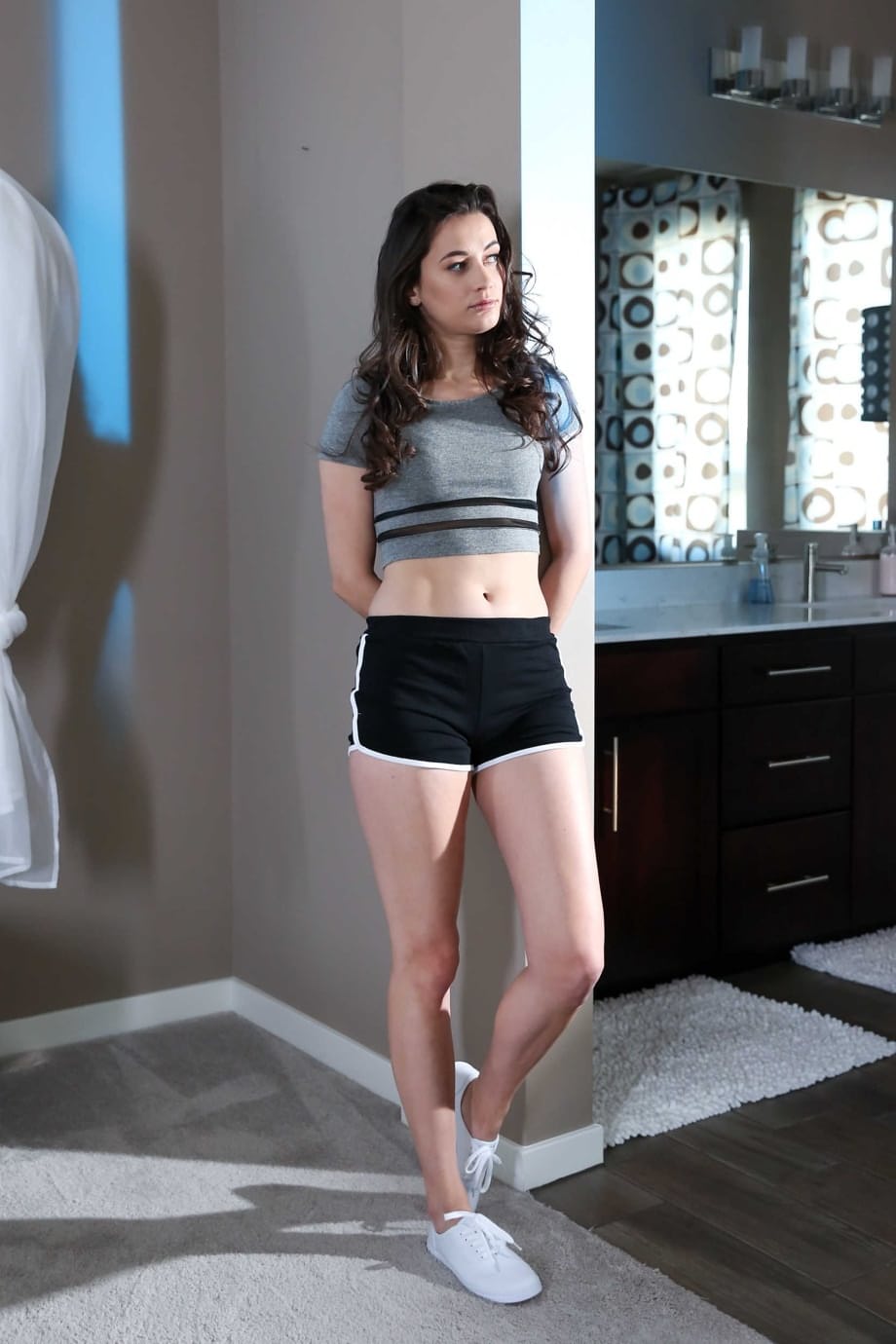 Brunette model with tiny tits Georgia Jones exposes her very hot body