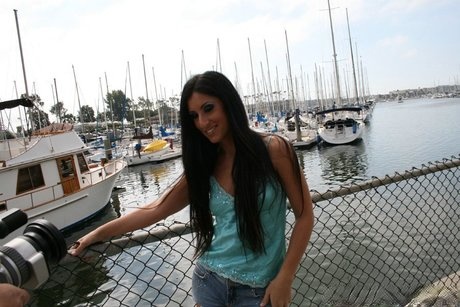 Latina girl Luscious Lopez shows her phat ass while in denim shorts