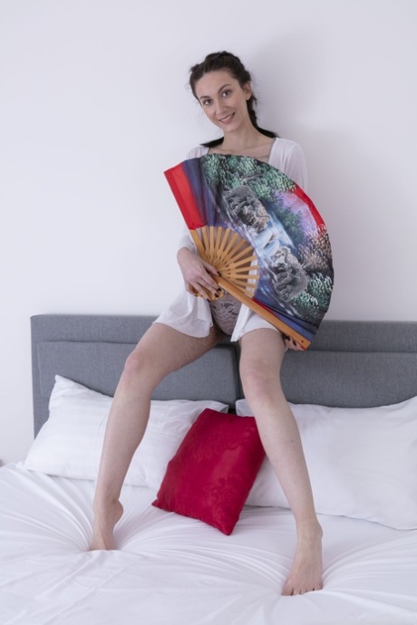 Tall American beauty Shirley Mo strips in a solo & shows her hairy body